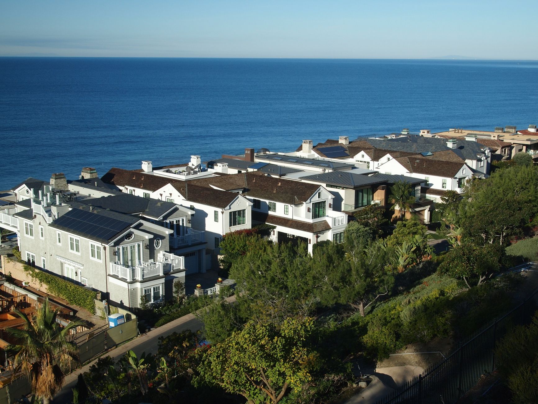 Local SEO in Dana Point, CA near Lantern Bay & Strand | OCWebPros. Stunning aerial view of coastal homes and the ocean in Dan