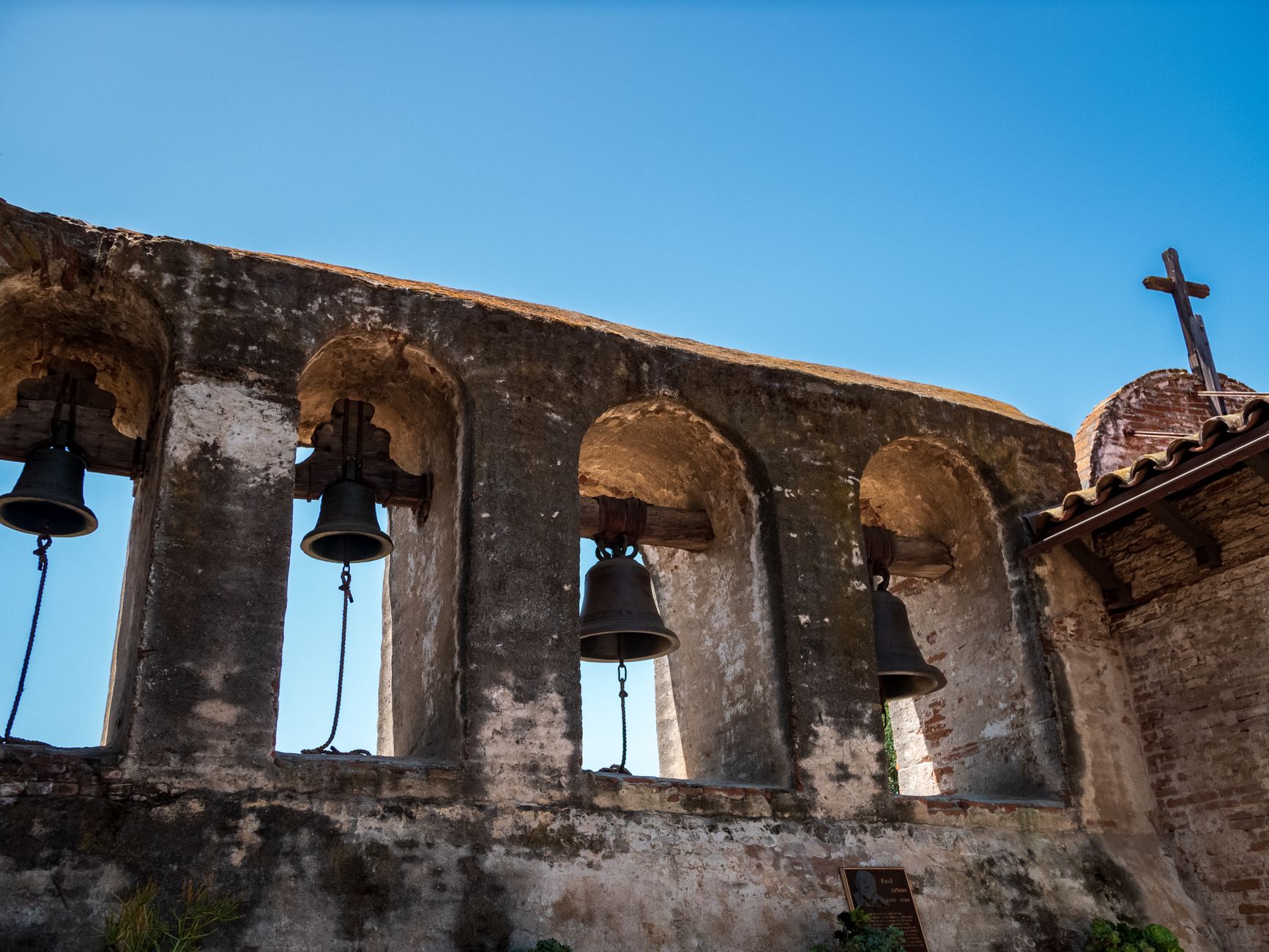 Local SEO in San Juan Capistrano, CA near Mission San Juan Capistrano area | OCWebPros. Low-angle view of the iconic bells at