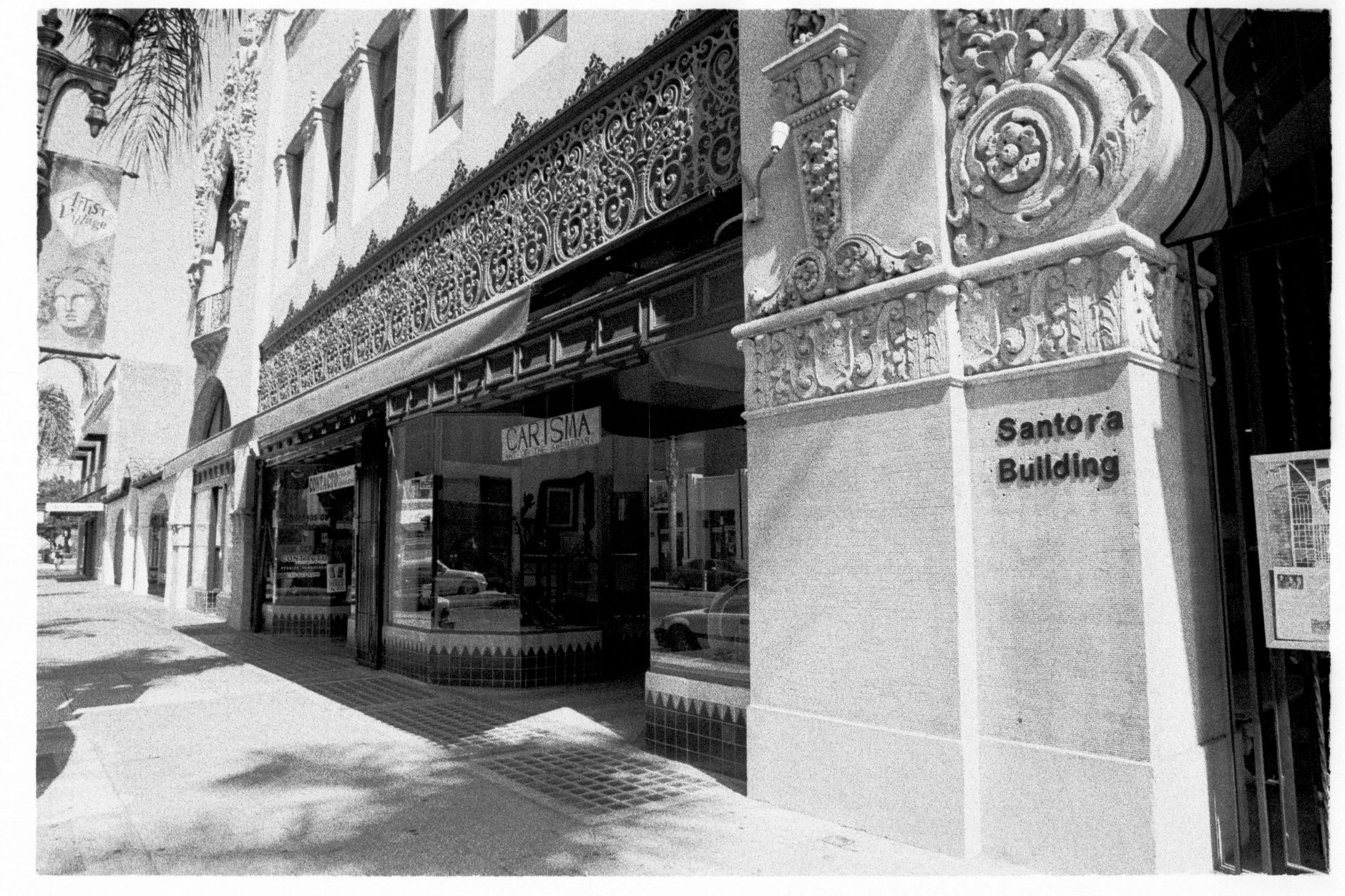 Local SEO in Santa Ana, CA near Logan & French Park | OCWebPros. Black and white photo of the Santora Building entrance in Sa